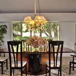 Formal Dining room with garden view beyond.