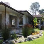 Family room porch with surrounding Koi pond and nook beyond.